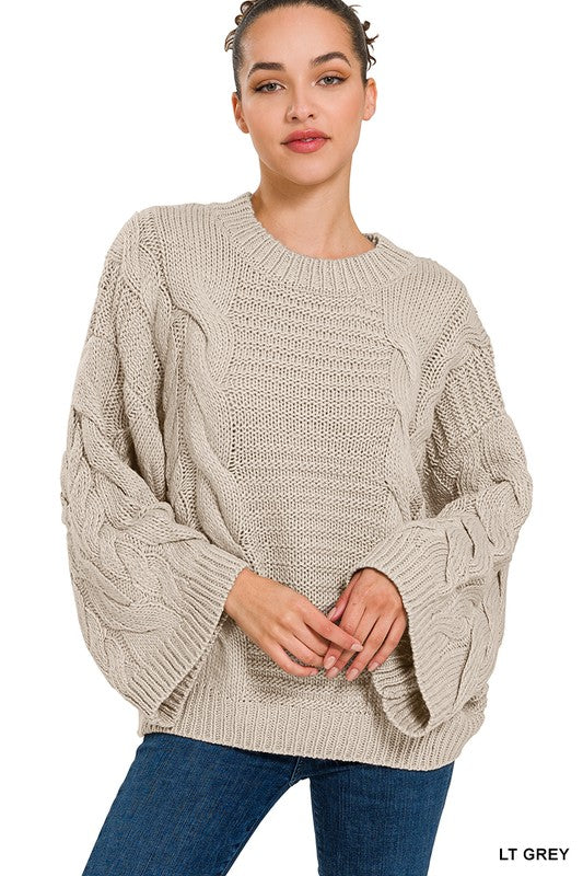 OVERSIZED BELL SLEEVE CABLE KNIT SWEATER